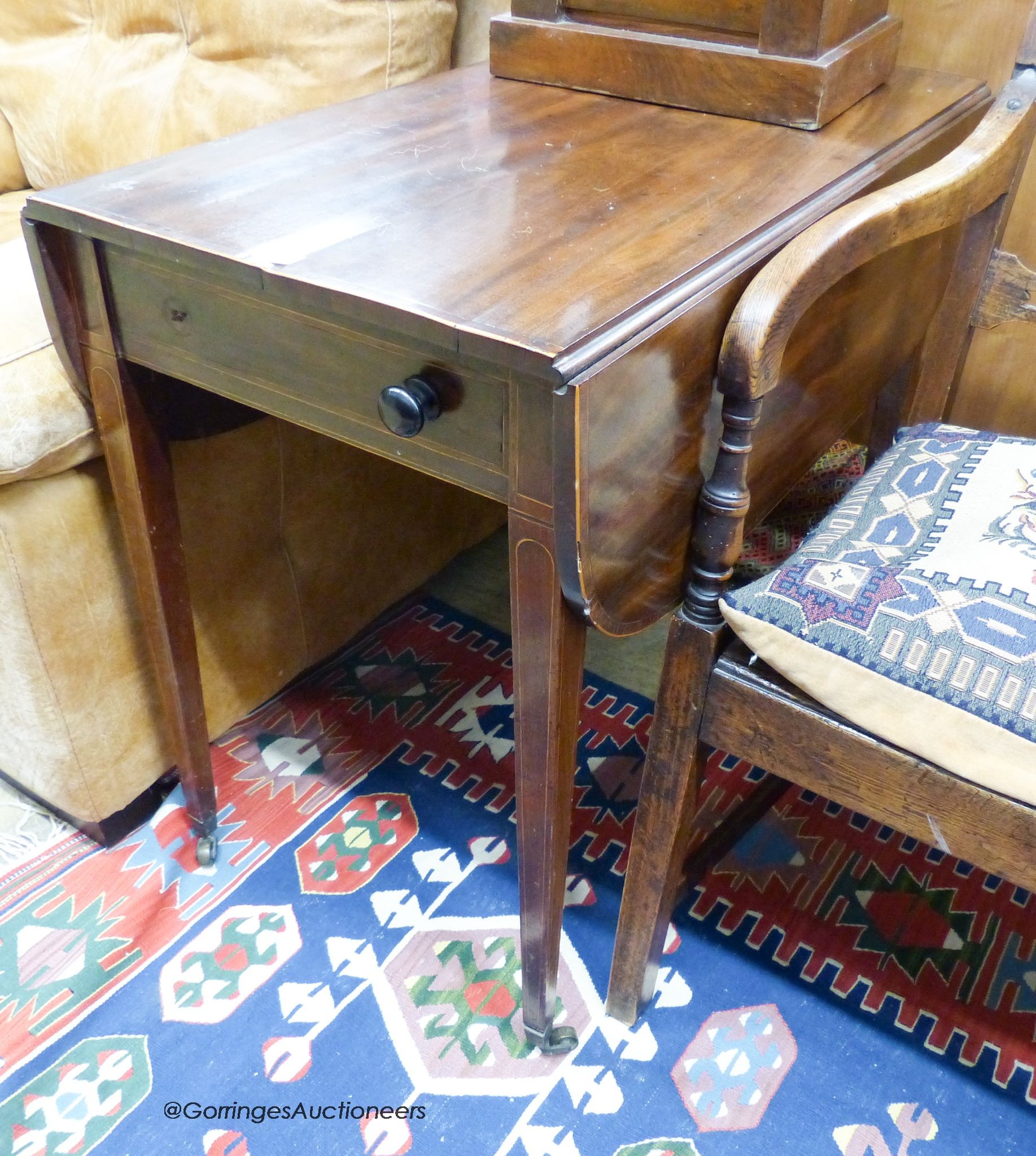 A George III mahogany inlaid Pembroke table, width 84cm, depth 48cm, height 71cm